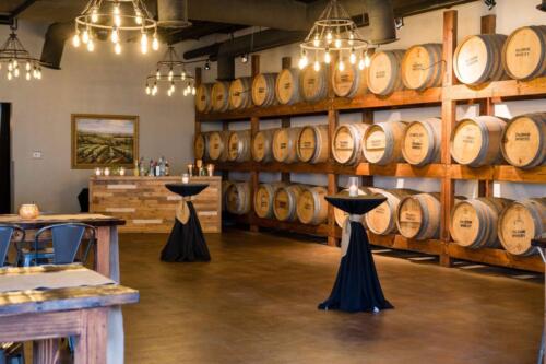Fallbrook-Cellar-view-of-bar-barrel-wall-and-farm-tables-web